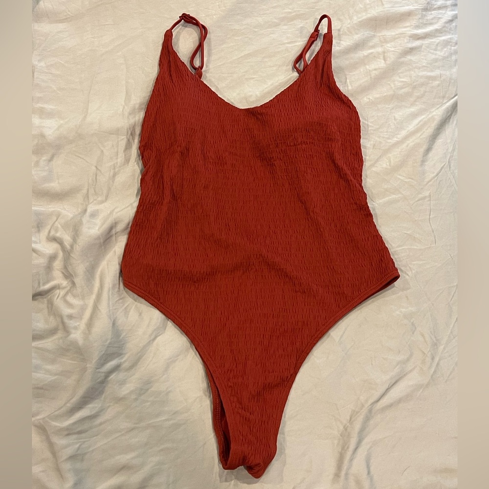 Never worn! Aerie Low Back Suit